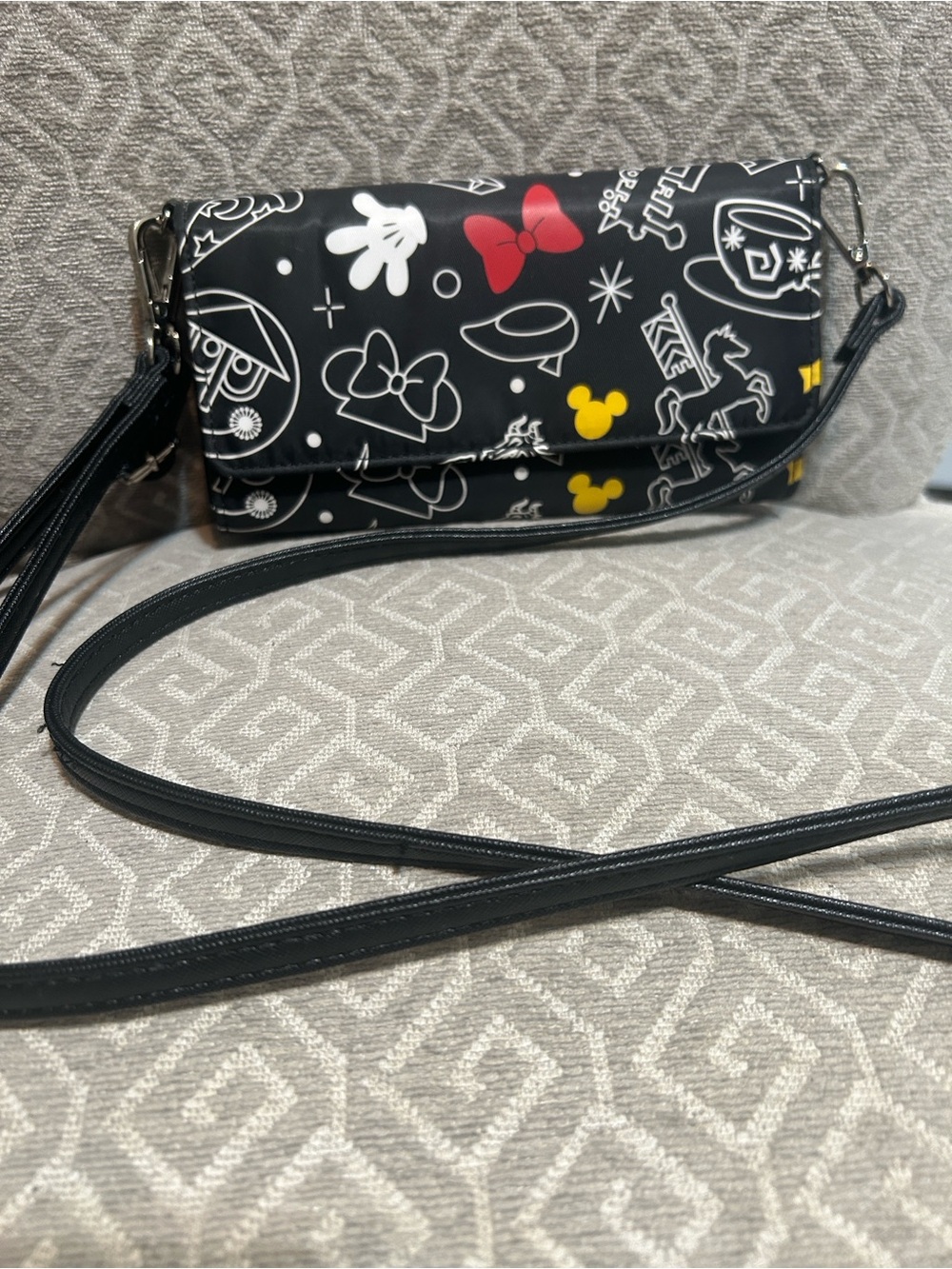 Disney Black Crossbody Bag with Red and Yellow Graphic Accents